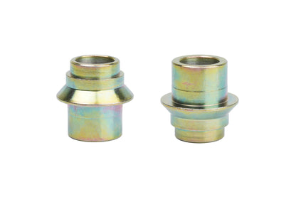 Gold bushing for BC Racing camber plates on white background