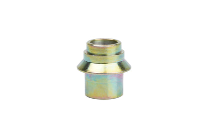 Gold bushing for BC Racing camber plates on white background