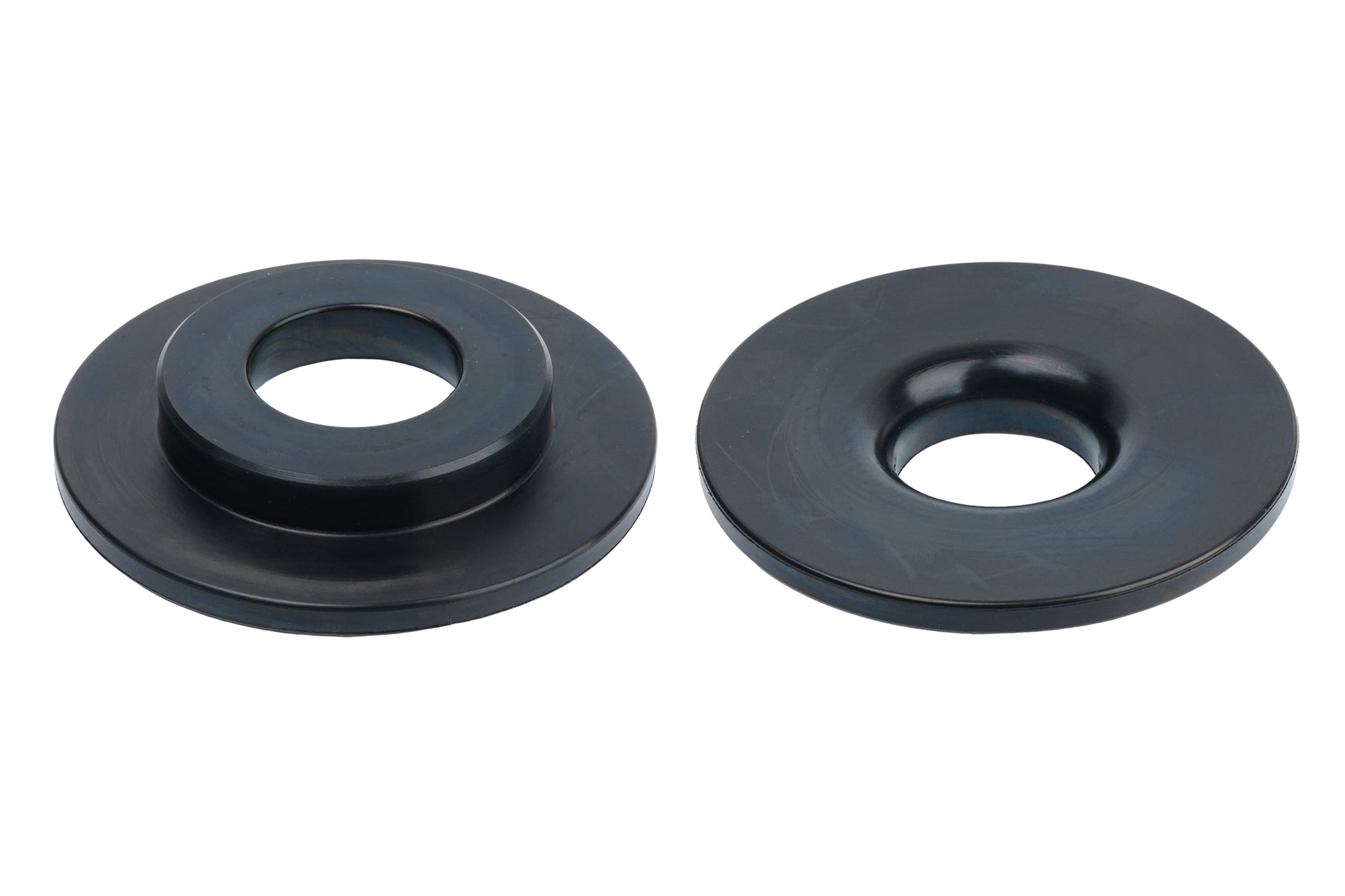 Black BC Racing rubber isolators on white background