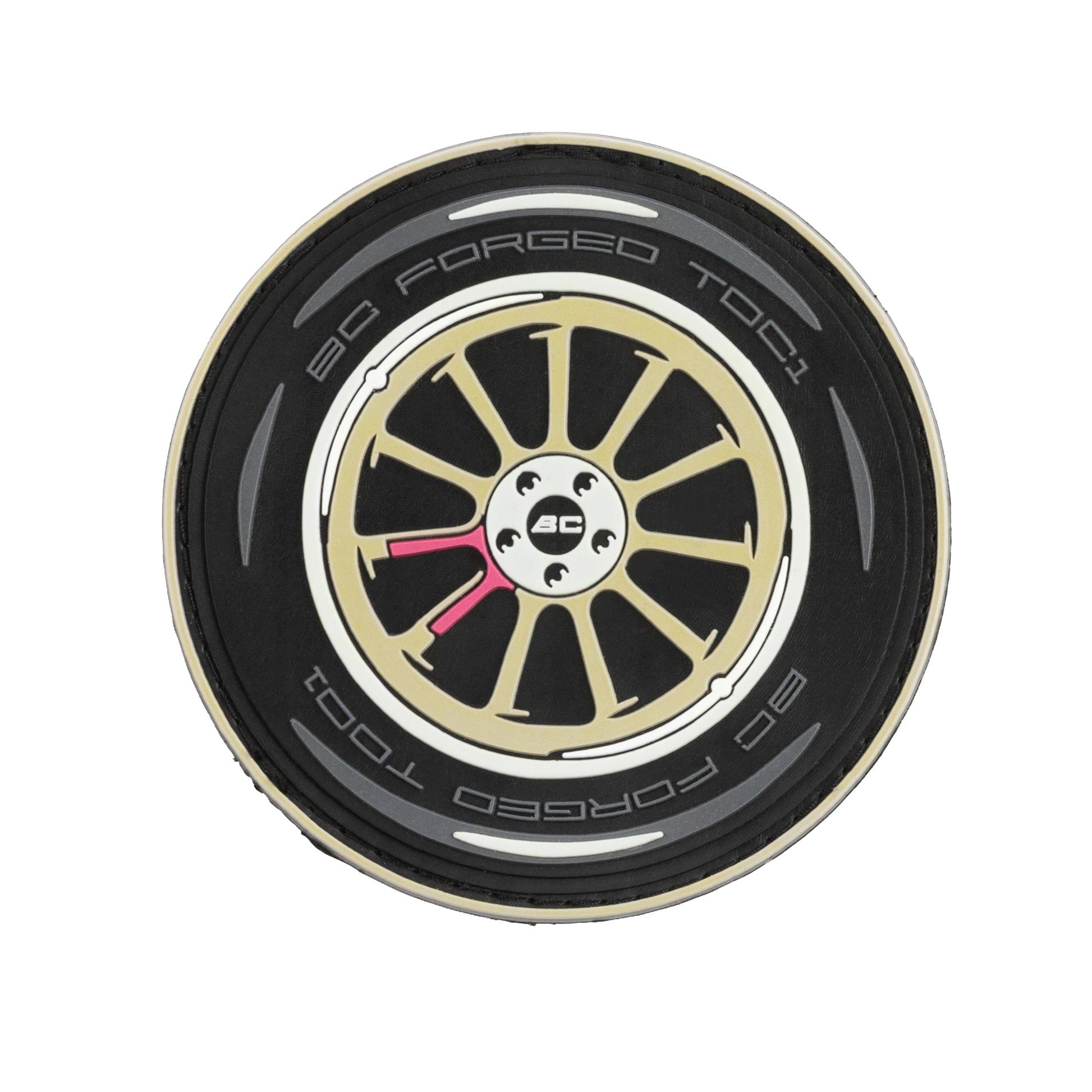 PVC patch of a BC Forged TD01 wheel in gold on a white background